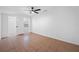 Neutral bedroom with tile flooring, ceiling fan, and closet at 5109 Horton Rd, Plant City, FL 33567