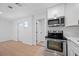 Bright kitchen with modern appliances showcases an open floor plan at 5109 Horton Rd, Plant City, FL 33567