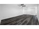 Bright living room boasts modern flooring and ample space for living and entertaining at 5109 Horton Rd, Plant City, FL 33567