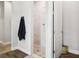 This bathroom features a step-in shower with white tile and a decorative pebble floor at 5314 Alafia Falls Dr, Lithia, FL 33547