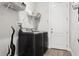 This laundry room has front load washer and dryer at 5314 Alafia Falls Dr, Lithia, FL 33547
