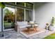 Cozy outdoor patio with comfortable seating and lush landscaping at 5314 Alafia Falls Dr, Lithia, FL 33547