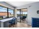Bright bedroom with office space and access to screened-in balcony with beautiful water views at 609 Lively Dr # B, Sun City Center, FL 33573
