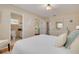Relaxing main bedroom with an attached bathroom, a dresser, and generous space at 6114 7Th S Ave, Gulfport, FL 33707