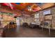 Unique recreation room with wood paneling, stone walls, and a fun, vintage atmosphere at 6114 7Th S Ave, Gulfport, FL 33707
