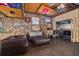 Recreation room with laundry area, vintage pinball machines and stone wall accents at 6114 7Th S Ave, Gulfport, FL 33707