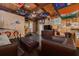 Spacious recreation room with wood paneling, stone accents and a TV viewing area at 6114 7Th S Ave, Gulfport, FL 33707