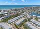 Gorgeous aerial view of oceanfront townhomes with private docks and stunning ocean views at 616 Garland Cir, Indian Rocks Beach, FL 33785