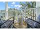 Serene balcony view with comfortable seating, perfect for relaxing and enjoying the outdoors at 616 Garland Cir, Indian Rocks Beach, FL 33785
