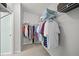 Spacious walk-in closet with metal racks and shelves provides ample storage space at 616 Garland Cir, Indian Rocks Beach, FL 33785