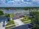 Aerial view of the home and surrounding landscaping, backyard, and waterfront community at 6425 Clair Shore Dr, Apollo Beach, FL 33572