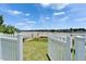 Gated access to backyard dock and lake at 6425 Clair Shore Dr, Apollo Beach, FL 33572