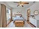 Cozy bedroom with bed, nightstand, and window at 6425 Clair Shore Dr, Apollo Beach, FL 33572
