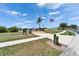 View of neighborhood's waterfront community gathering space featuring American flags at 6425 Clair Shore Dr, Apollo Beach, FL 33572