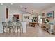 Inviting dining area with a stylish table set, bright window, and modern decor for comfortable Gathering meals at 6425 Clair Shore Dr, Apollo Beach, FL 33572