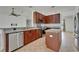 Updated kitchen with stainless steel appliances, granite countertops, and a breakfast bar at 6425 Clair Shore Dr, Apollo Beach, FL 33572