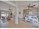 Bright open-concept living room with elegant decor, comfortable seating, and seamless flow at 6425 Clair Shore Dr, Apollo Beach, FL 33572