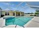 Sparkling screened pool with attached spa and covered lanai offers an outdoor retreat at 6425 Clair Shore Dr, Apollo Beach, FL 33572