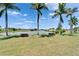 Community lake view with picnic tables at 6425 Clair Shore Dr, Apollo Beach, FL 33572