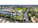 Aerial shot showing house's location in a waterfront neighborhood, and proximity to the canal at 6522 Simone Shores Cir, Apollo Beach, FL 33572