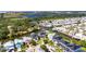 Stunning aerial shot showing home's location within waterfront community and solar farm view at 6522 Simone Shores Cir, Apollo Beach, FL 33572