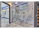 Glass shower stall with dual shower heads at 6522 Simone Shores Cir, Apollo Beach, FL 33572