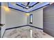 Well-lit bedroom with ceiling fan and corner windows allowing for natural light at 6522 Simone Shores Cir, Apollo Beach, FL 33572