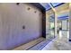 Stylish entryway with mirrored accent wall and modern lighting at 6522 Simone Shores Cir, Apollo Beach, FL 33572