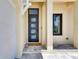 Welcoming front entrance with modern door and stylish porch at 6522 Simone Shores Cir, Apollo Beach, FL 33572