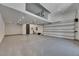 Spacious garage with concrete floor and modern garage door at 6522 Simone Shores Cir, Apollo Beach, FL 33572