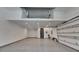 Spacious garage with concrete floor and modern garage door at 6522 Simone Shores Cir, Apollo Beach, FL 33572