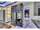Modern kitchen with stainless steel refrigerator and built in ovens at 6522 Simone Shores Cir, Apollo Beach, FL 33572