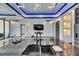 Kitchen island with sink, modern faucet, and pendant lighting at 6522 Simone Shores Cir, Apollo Beach, FL 33572