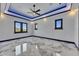 Bright main bedroom with recessed lighting and marble floors at 6522 Simone Shores Cir, Apollo Beach, FL 33572