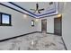 Bright main bedroom with recessed lighting and marble floors at 6522 Simone Shores Cir, Apollo Beach, FL 33572