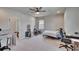 A cozy bedroom featuring carpeted floors and a ceiling fan, offering a simple and serene atmosphere at 7203 1/2 S West Shore Blvd, Tampa, FL 33616