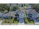 Charming two-story home with manicured lawn, inviting front porch, and a driveway for a great curb appeal at 7203 1/2 S West Shore Blvd, Tampa, FL 33616
