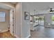 Open kitchen with island seating, stainless appliances, and an adjacent exterior area at 7203 1/2 S West Shore Blvd, Tampa, FL 33616