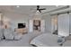 Spacious main bedroom leads to bathroom, spare room with piano, and walk in closet at 7203 1/2 S West Shore Blvd, Tampa, FL 33616