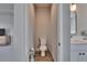 Private toilet room located adjacent to bedroom and main bathroom at 7203 1/2 S West Shore Blvd, Tampa, FL 33616