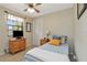 Cozy bedroom with natural light, neutral paint, and furnishings at 9465 126Th Ave, Largo, FL 33773