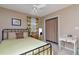 Bedroom featuring a ceiling fan, neutral walls, and large window at 9465 126Th Ave, Largo, FL 33773