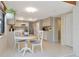 Eat-in kitchen features tile floors, stainless appliances and a breakfast nook with bright natural light at 9465 126Th Ave, Largo, FL 33773