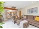 Cozy living room featuring an open concept design with easy access to the adjacent kitchen and dining area at 9465 126Th Ave, Largo, FL 33773