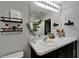 Bright bathroom featuring a double sink vanity, lots of counter space and decor at 9720 Hound Chase Dr, Gibsonton, FL 33534