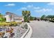 The Copper Creek entrance is beautifully landscaped, creating an inviting feel for residents and guests at 9720 Hound Chase Dr, Gibsonton, FL 33534