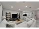Cozy living space featuring kitchen bar and seamless flow to the entertainment area at 9720 Hound Chase Dr, Gibsonton, FL 33534