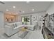 Comfortable living room with stylish décor and seamlessly connected to a dining area at 9720 Hound Chase Dr, Gibsonton, FL 33534