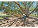 A lovely community playground surrounded by mature trees offers a shaded retreat for neighborhood children at 9720 Hound Chase Dr, Gibsonton, FL 33534