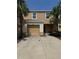 Charming townhouse featuring a one car garage and a well-maintained yard at 9833 Hound Chase Dr, Gibsonton, FL 33534